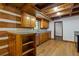 Charming kitchen featuring wooden cabinets, stainless steel appliances, and granite countertops at 2377 Pine Mountain Rd, Kennesaw, GA 30152