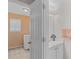 Practical bath and laundry combo with modern vanity and neutral tones at 240 Creekview Blvd, Covington, GA 30016
