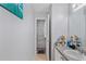 Small, light bathroom with standard sink, countertop, toilet, and shower at 240 Creekview Blvd, Covington, GA 30016