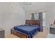 Vaulted ceiling bedroom featuring a queen bed and neutral walls and tones at 240 Creekview Blvd, Covington, GA 30016