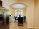 Bright dining room featuring a stylish chandelier and seating for six at 6156 Thorncrest Dr, Tucker, GA 30084