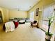 Comfortable living room with large windows, ample seating, and neutral decor at 6156 Thorncrest Dr, Tucker, GA 30084