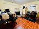 Spacious office space featuring hardwood floors, large windows, and ample light at 6156 Thorncrest Dr, Tucker, GA 30084