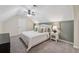 Comfortable bedroom with plush carpet, a ceiling fan, neutral tones, and tasteful decor at 831 Terrace Trce, Lawrenceville, GA 30044