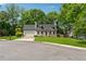 Charming home featuring a red front door, front porch and front lawn at 831 Terrace Trce, Lawrenceville, GA 30044