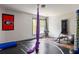 Spacious home gym is equipped with various workout machines, creating a dedicated fitness space at 10559 Serenbe Ln, Chattahoochee Hills, GA 30268
