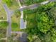 Aerial view of home with lush green trees, shrubbery and neighborhood at 1448 Drayton Woods Dr, Tucker, GA 30084