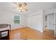 Bedroom with hardwood floors, ample closet space, and natural light at 1448 Drayton Woods Dr, Tucker, GA 30084