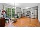 Bright, updated kitchen with stainless steel appliances, granite countertops, and stylish gray cabinetry at 1448 Drayton Woods Dr, Tucker, GA 30084
