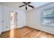 Bright bedroom with wood floors, neutral walls, and a window at 1259 Crescentwood Ln, Decatur, GA 30032
