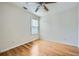 Neutral bedroom featuring wood flooring and a ceiling fan at 1259 Crescentwood Ln, Decatur, GA 30032