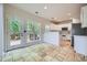 Inviting kitchen nook with white cabinetry, stainless steel appliances, and access to a deck at 1259 Crescentwood Ln, Decatur, GA 30032