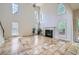 Bright living room boasting soaring ceilings, a fireplace, and large windows at 1259 Crescentwood Ln, Decatur, GA 30032