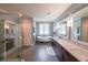 Elegant bathroom features a soaking tub, separate shower, double vanity, and stylish fixtures at 150 Shady Grove Ln, Alpharetta, GA 30009