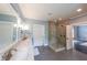 Bright bathroom features a large glass shower, double vanity, and access to the main bedroom at 150 Shady Grove Ln, Alpharetta, GA 30009