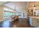 Open-concept dining area with backyard views and access to the gourmet kitchen at 150 Shady Grove Ln, Alpharetta, GA 30009
