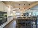 Gourmet kitchen with island, granite countertops, stainless steel appliances, and breakfast bar at 150 Shady Grove Ln, Alpharetta, GA 30009