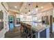 Modern kitchen with a large island, stainless steel appliances, and custom cabinets at 150 Shady Grove Ln, Alpharetta, GA 30009