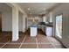 Modern kitchen with white cabinetry and a center island with granite countertop at 1956 Asher Ln # 51, Conyers, GA 30013