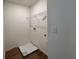 Functional laundry room with a utility sink and shelving at 1956 Asher Ln # 51, Conyers, GA 30013