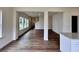 Open-concept living room featuring hardwood floors and ample natural light at 1956 Asher Ln # 51, Conyers, GA 30013