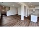 Open-concept living room featuring hardwood floors and neutral walls at 1956 Asher Ln # 51, Conyers, GA 30013