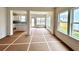 Bright living area featuring a kitchen view and large windows at 1956 Asher Ln # 51, Conyers, GA 30013