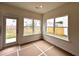 Sun room with large windows providing abundant natural light and views of the backyard at 1956 Asher Ln # 51, Conyers, GA 30013