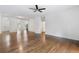 Open floor plan living room features hardwood floors and natural lighting at 3881 Moore Rd, Ellenwood, GA 30294