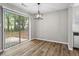 Bright dining area with new floors and sliding door access to the backyard at 1360 Terramount Dr, Roswell, GA 30076