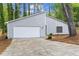 Attractive single Gathering home features a one-car garage and freshly landscaped front yard at 1360 Terramount Dr, Roswell, GA 30076