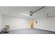 Spacious two car garage with painted walls, clean floor, and an automatic door at 1360 Terramount Dr, Roswell, GA 30076