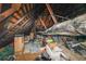 View of the attic space with exposed rafters and ductwork at 224 Bass Sw St, Atlanta, GA 30315