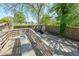 Wooden walkway leading to a patio and fenced yard at 224 Bass Sw St, Atlanta, GA 30315