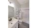 Clean bathroom features a modern sink and walk in shower combo space with black hardware accents at 224 Bass Sw St, Atlanta, GA 30315