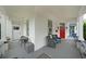 Spacious front porch with seating area, showcasing the home's inviting exterior and curb appeal at 224 Bass Sw St, Atlanta, GA 30315