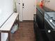 Organized garage features ample storage with tool chests and a work bench at 224 Bass Sw St, Atlanta, GA 30315