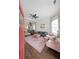 Bright living room with hardwood floors, stylish furnishings, and a spiral staircase feature at 224 Bass Sw St, Atlanta, GA 30315