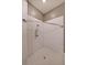 Tiled stand up shower stall with white subway tile surround and contrasting dark fixtures and hardware at 224 Bass Sw St, Atlanta, GA 30315
