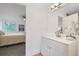 Modern bathroom features a bright vanity with decorative mirror and white trim at 234 Pam Sw Ln, Marietta, GA 30064