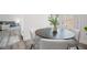 Cozy dining area with hardwood floors, neutral color scheme, and view to the living room at 234 Pam Sw Ln, Marietta, GA 30064