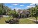 Beautiful stone and brick exterior with lush landscaping and a community pool at 234 Pam Sw Ln, Marietta, GA 30064