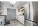 Bright kitchen with stainless steel appliances, granite countertops, ample storage, and skylight providing natural light at 234 Pam Sw Ln, Marietta, GA 30064