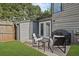 Cozy backyard patio featuring patio furniture and an outdoor grill at 234 Pam Sw Ln, Marietta, GA 30064