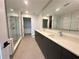Bathroom with a glass shower and double sink vanity at 788 W Marietta Nw St # 905, Atlanta, GA 30318