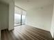 Bright bedroom features a large window at 788 W Marietta Nw St # 905, Atlanta, GA 30318