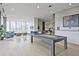 Spacious billiards room with comfortable seating, fireplace, and plenty of natural light at 788 W Marietta Nw St # 905, Atlanta, GA 30318