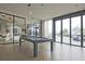 Stylish billiards room with a pool table, seating area, and large windows offering great views at 788 W Marietta Nw St # 905, Atlanta, GA 30318