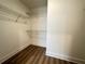 Walk-in closet with wire shelving for organized storage at 788 W Marietta Nw St # 905, Atlanta, GA 30318