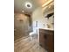 Updated bathroom with tiled shower, modern vanity, and bronze fixtures at 1959 Oana Sw St, Atlanta, GA 30310
